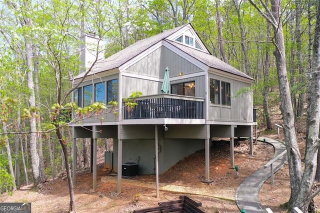 125 Wolfscratch, Big Canoe, GA 30143 - back of property with roof with shingles, a deck, and a chimney