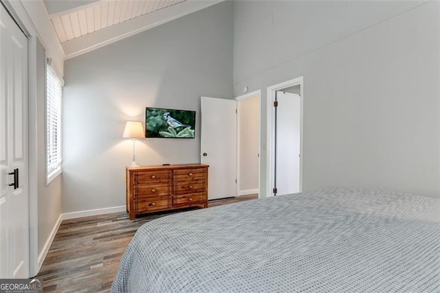 125 Wolfscratch, Big Canoe, GA 30143 - bedroom with wood finished floors, multiple windows, and high vaulted ceiling