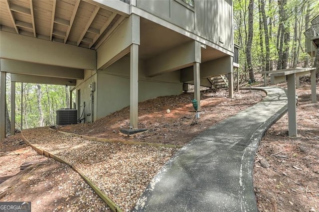 125 Wolfscratch, Big Canoe, GA 30143 - view of side of property with a central AC unit and stairway
