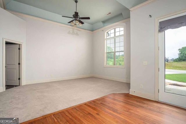 1811 Traditions Way, Jefferson, GA 30549 - carpeted empty room with wood finished floors and ceiling fan