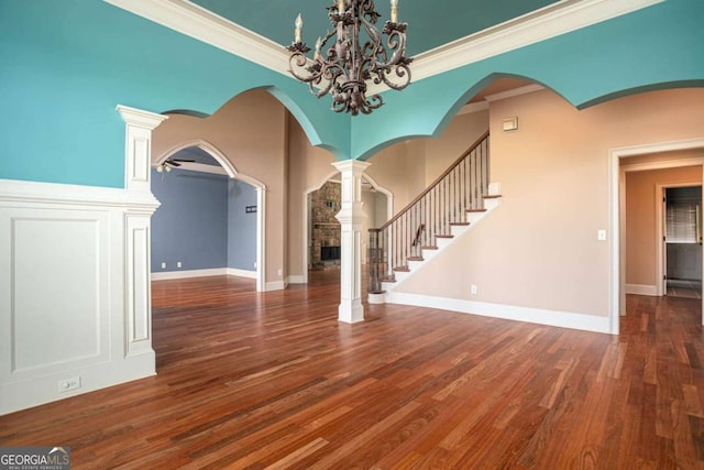 1811 Traditions Way, Jefferson, GA 30549 - entryway featuring wood finished floors, crown molding, a chandelier, and stairs
