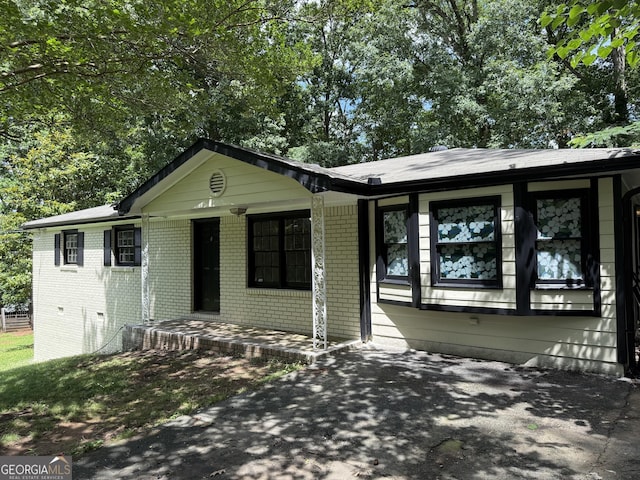 2095 Mulkey Rd SW, Marietta, GA 30008 - ranch-style home with brick siding and covered porch