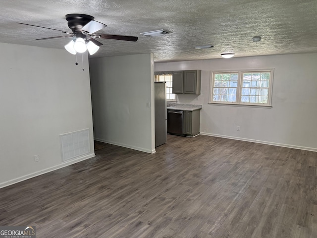 2095 Mulkey Rd SW, Marietta, GA 30008 - unfurnished living room featuring dark wood finished floors, ceiling fan, and a textured ceiling