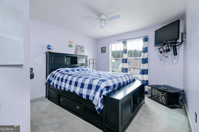 3251 Hunters Crossing Pt, Lithonia, GA 30038 - carpeted bedroom with ceiling fan and baseboards