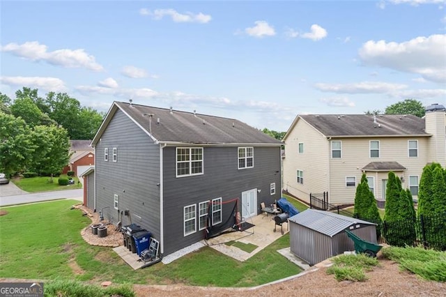 1657 Bradmere Ln, Lithia Springs, GA 30122 - rear view of property with a patio