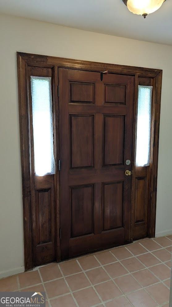 67 Wilder Dr, Forsyth, GA 31029 - foyer entrance featuring healthy amount of natural light