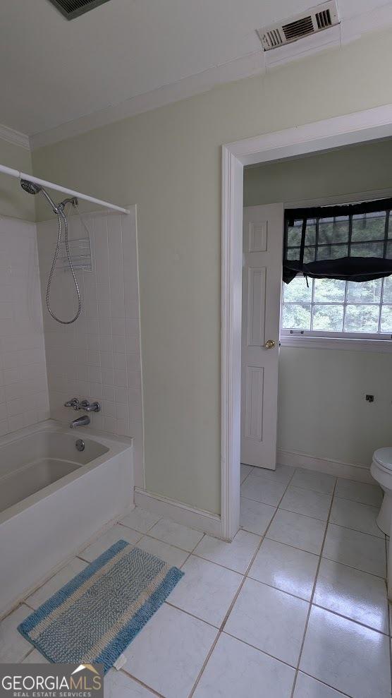 67 Wilder Dr, Forsyth, GA 31029 - full bathroom with tile patterned floors and tub / shower combination
