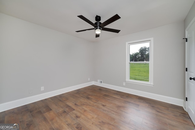 858 Pates Creek Rd, Stockbridge, GA 30281 - empty room with ceiling fan and dark wood-type flooring