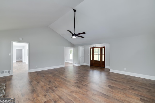 858 Pates Creek Rd, Stockbridge, GA 30281 - unfurnished living room featuring a ceiling fan, dark wood finished floors, and high vaulted ceiling