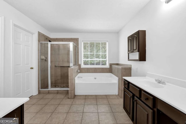 5565 Ashmoore Ct, Flowery Branch, GA 30542 - bathroom with vanity, a shower stall, and tile patterned floors