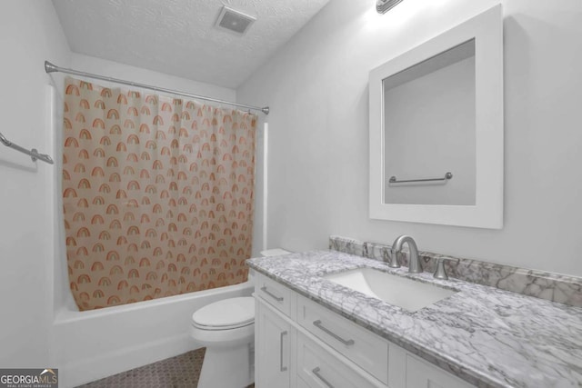 5565 Ashmoore Ct, Flowery Branch, GA 30542 - full bathroom with vanity, shower / bathtub combination with curtain, a textured ceiling, and tile patterned flooring