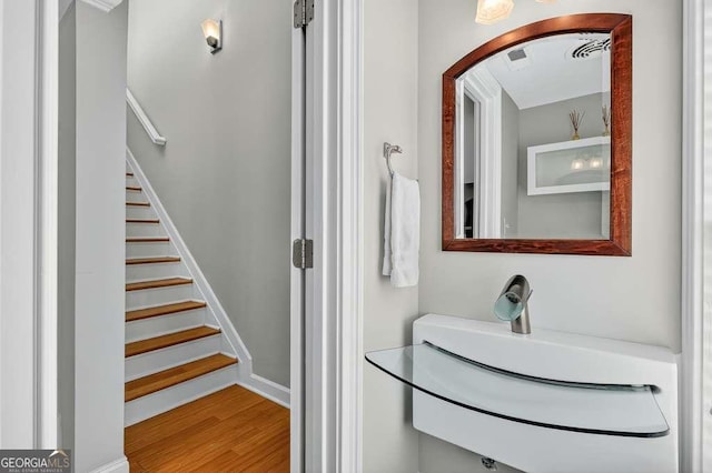 3541 Roswell Rd NE Unit 21, Atlanta, GA 30305 - bathroom with wood finished floors and a sink