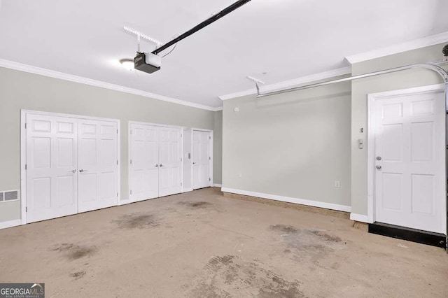 3541 Roswell Rd NE Unit 21, Atlanta, GA 30305 - garage featuring a garage door opener and baseboards