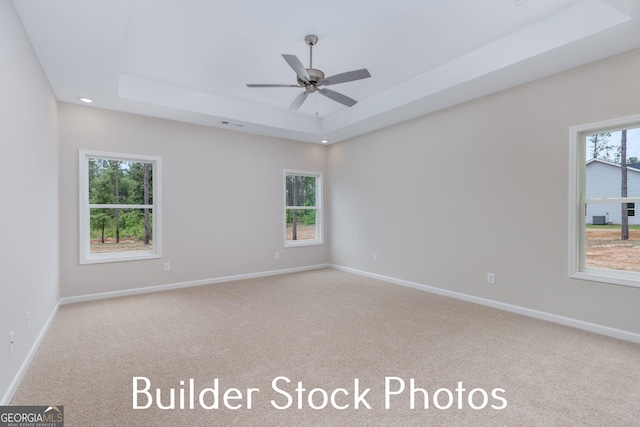 LOT6 The Rock Rd, Thomaston, GA 30286 - carpeted spare room featuring a ceiling fan, a raised ceiling, and recessed lighting