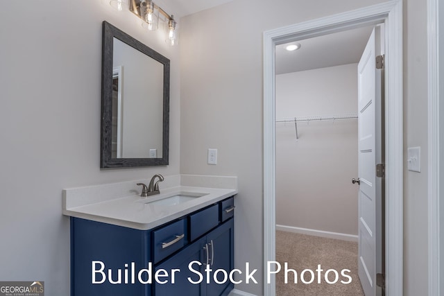 LOT6 The Rock Rd, Thomaston, GA 30286 - bathroom with vanity and a walk in closet
