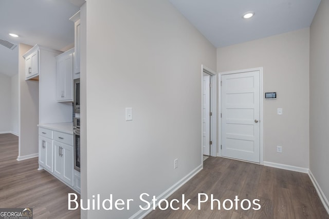 LOT6 The Rock Rd, Thomaston, GA 30286 - corridor with dark wood-style flooring and recessed lighting