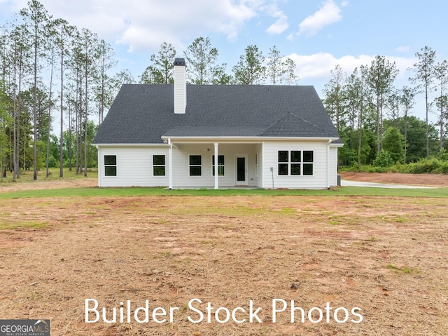 LOT6 The Rock Rd, Thomaston, GA 30286 - view of front of home featuring a chimney and a front yard