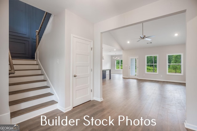 LOT6 The Rock Rd, Thomaston, GA 30286 - staircase featuring ceiling fan, wood finished floors, a chandelier, vaulted ceiling, and recessed lighting