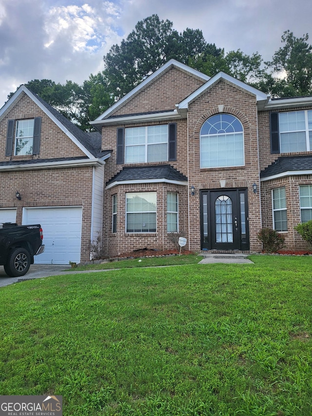 1962 Bridgestone Cir, Conyers, GA 30012 - traditional-style house with a front lawn, brick siding, and a garage