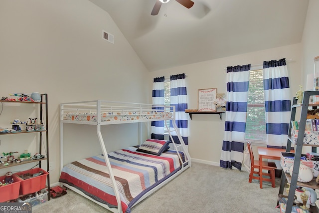 108 Village Pl, Newnan, GA 30265 - carpeted bedroom with vaulted ceiling, multiple windows, and a ceiling fan