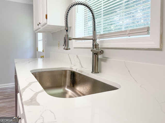 5156 Allison Way, Sugar Hill, GA 30518 - kitchen view of white cabinetry and light stone counters