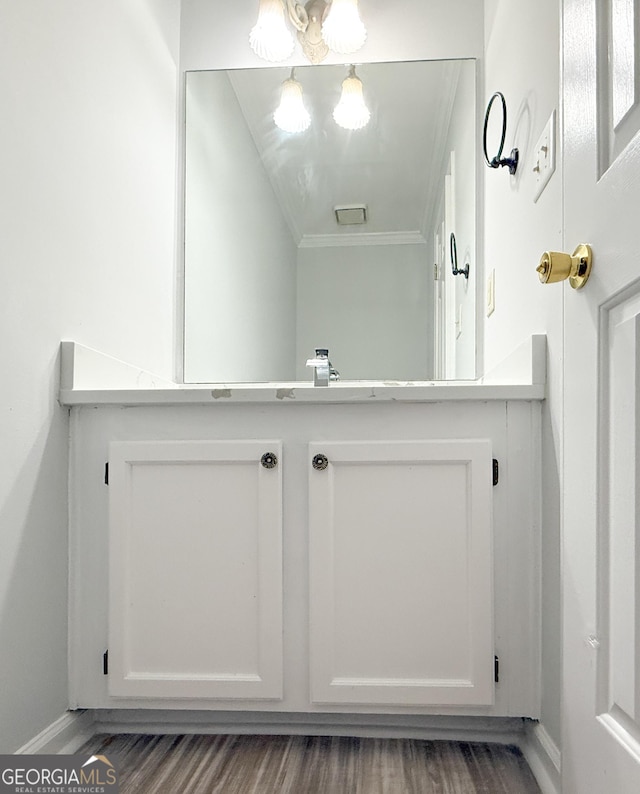 5156 Allison Way, Sugar Hill, GA 30518 - bathroom with ornamental molding and wood finished floors