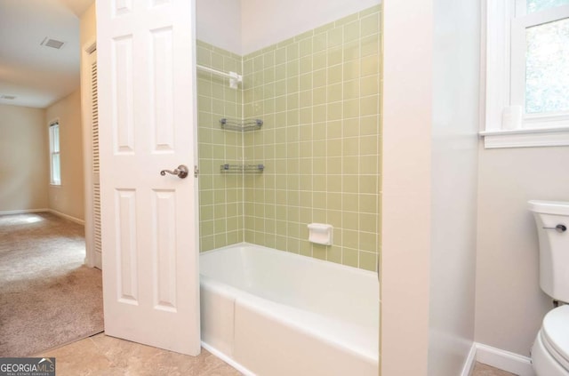 4714 Marc Ct SW, Lilburn, GA 30047 - bathroom with toilet and shower / bath combination