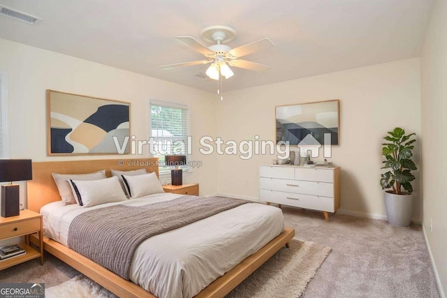 4714 Marc Ct SW, Lilburn, GA 30047 - bedroom featuring light colored carpet and a ceiling fan