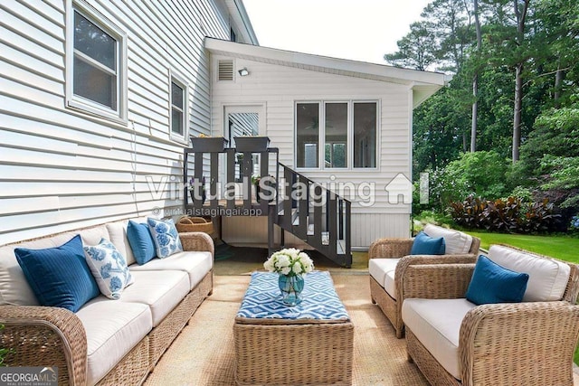 4714 Marc Ct SW, Lilburn, GA 30047 - wooden terrace featuring an outdoor living space