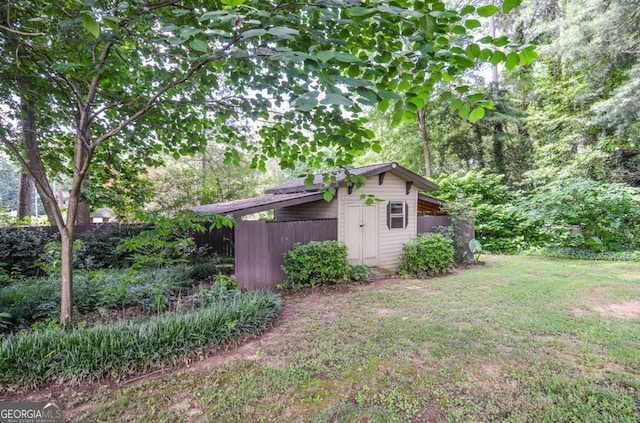 4714 Marc Ct SW, Lilburn, GA 30047 - view of yard with an outbuilding