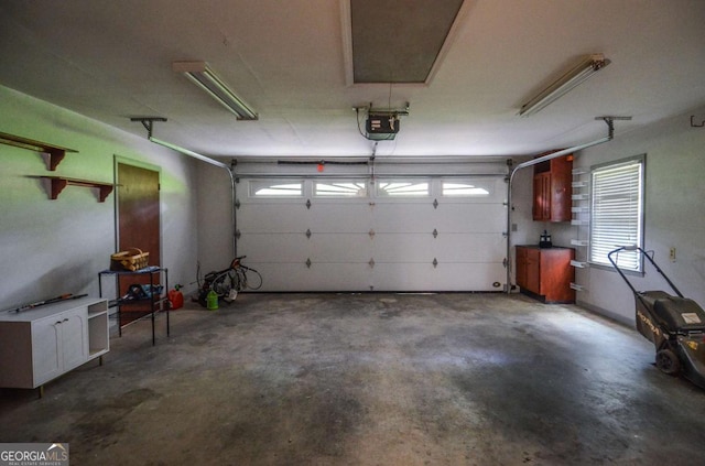 4714 Marc Ct SW, Lilburn, GA 30047 - garage featuring a garage door opener