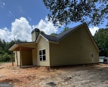 103 New Home Rd, Rockmart, GA 30153 - view of property exterior with a chimney