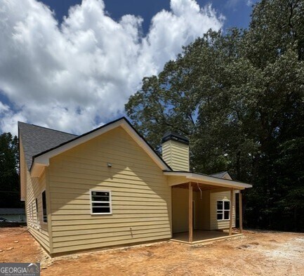 103 New Home Rd, Rockmart, GA 30153 - view of home's exterior featuring a chimney