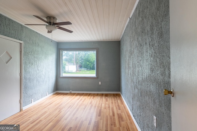 290 Mcree Dr, Camilla, GA 31730 - spare room featuring wood finished floors, a ceiling fan, and ornamental molding
