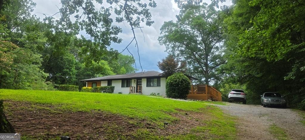 4916 Campbellton Rd SW, South Fulton, GA 30331 - view of front of home featuring a front lawn and driveway