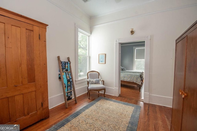 202 E Oak St, Luthersville, GA 30251 - living area featuring wood finished floors and ornamental molding