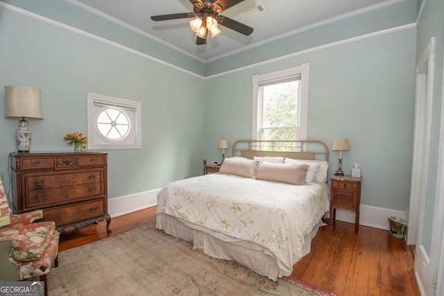 202 E Oak St, Luthersville, GA 30251 - bedroom featuring wood finished floors, ornamental molding, and a ceiling fan