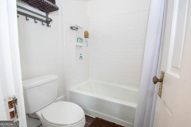 202 E Oak St, Luthersville, GA 30251 - bathroom featuring toilet and shower / bath combo with shower curtain