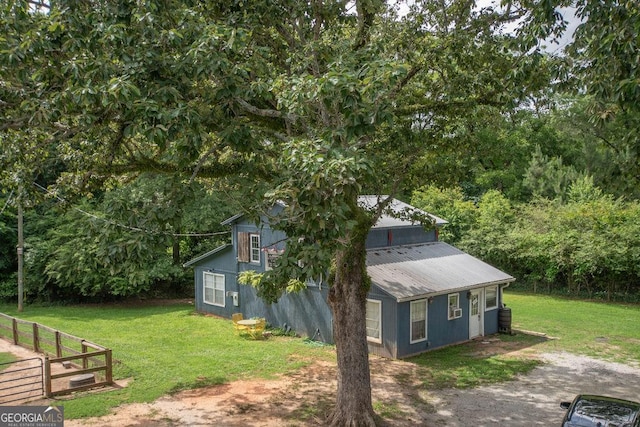 202 E Oak St, Luthersville, GA 30251 - view of property exterior featuring a metal roof