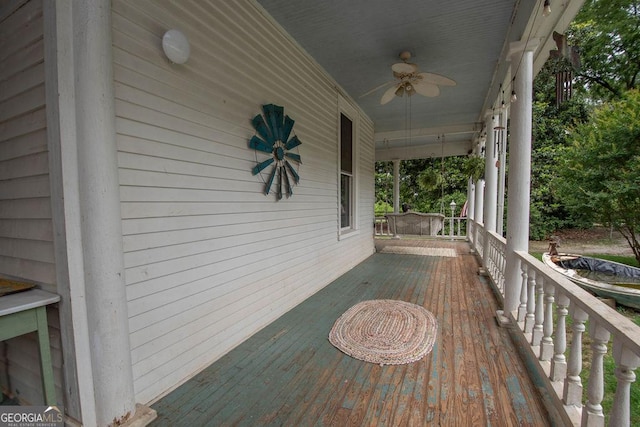 202 E Oak St, Luthersville, GA 30251 - wooden porch featuring a ceiling fan