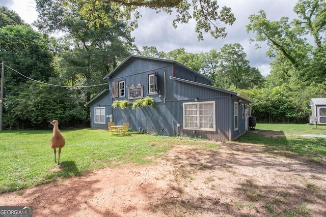 202 E Oak St, Luthersville, GA 30251 - view of front of house featuring a front yard