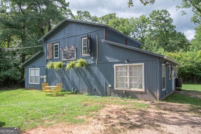 202 E Oak St, Luthersville, GA 30251 - view of home's exterior featuring a lawn