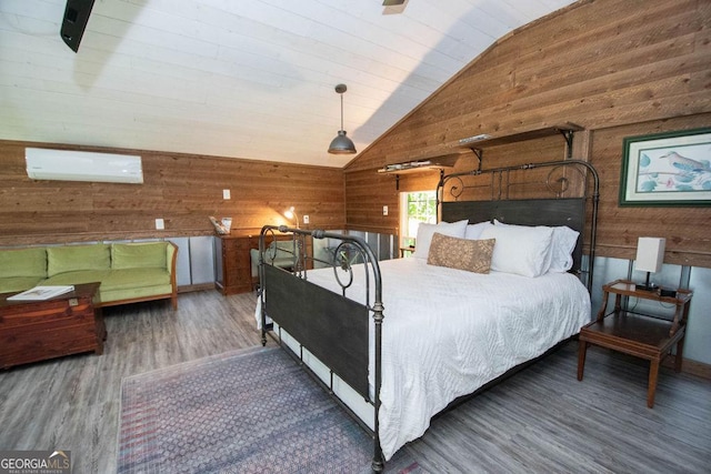202 E Oak St, Luthersville, GA 30251 - bedroom featuring wood walls, wood finished floors, vaulted ceiling, a wall unit AC, and wooden ceiling