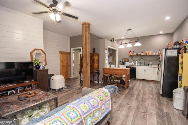 202 E Oak St, Luthersville, GA 30251 - kitchen with black appliances, light wood-style floors, open shelves, light countertops, and white cabinets