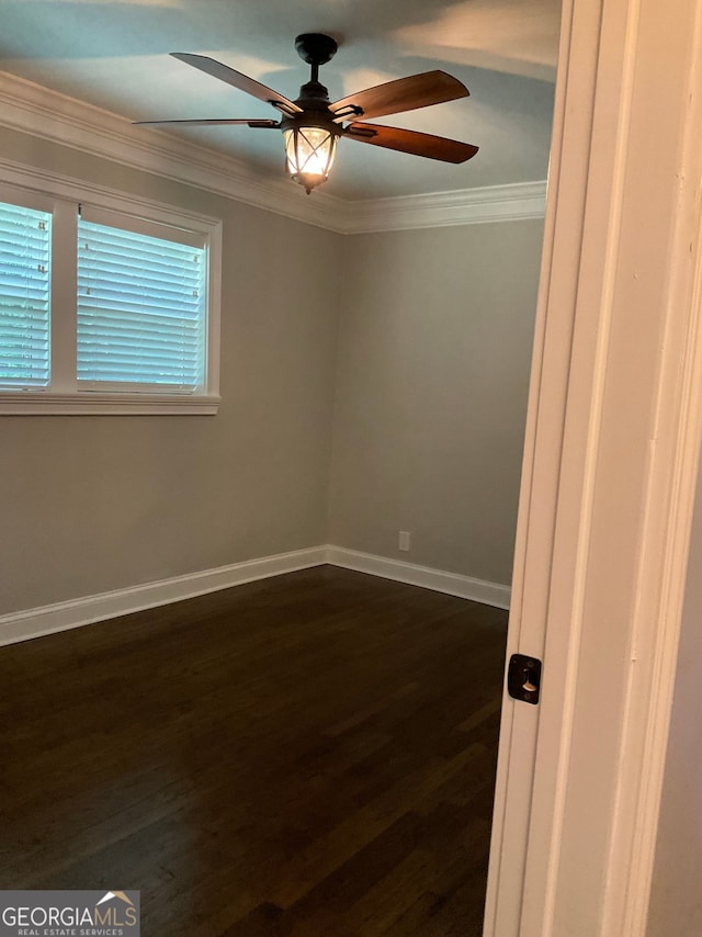 2170 Beecher Cir SW, Atlanta, GA 30311 - empty room featuring crown molding, a ceiling fan, and dark wood-style flooring