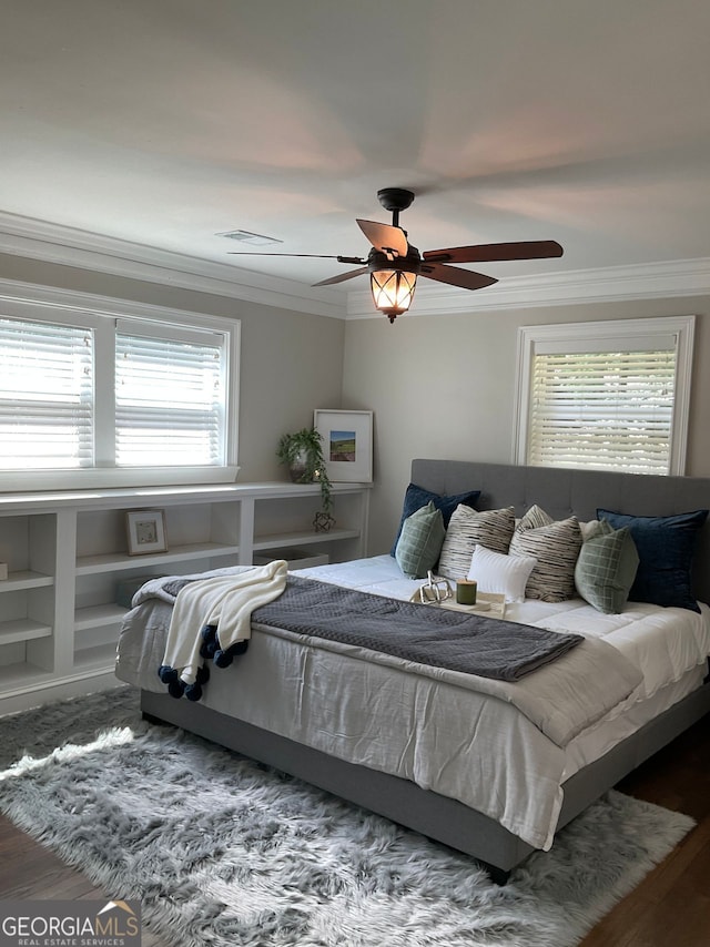 2170 Beecher Cir SW, Atlanta, GA 30311 - bedroom featuring crown molding, wood finished floors, and ceiling fan