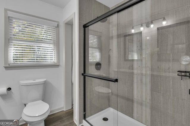 322 Pea Ridge Rd, Franklin, GA 30217 - full bath with a shower stall and wood finished floors