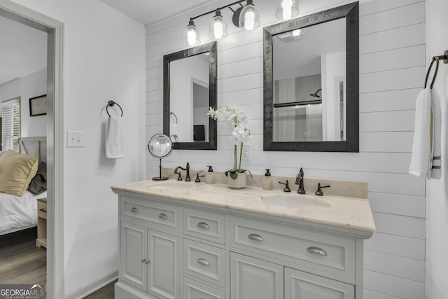 322 Pea Ridge Rd, Franklin, GA 30217 - ensuite bathroom featuring double vanity, wood finished floors, and a shower