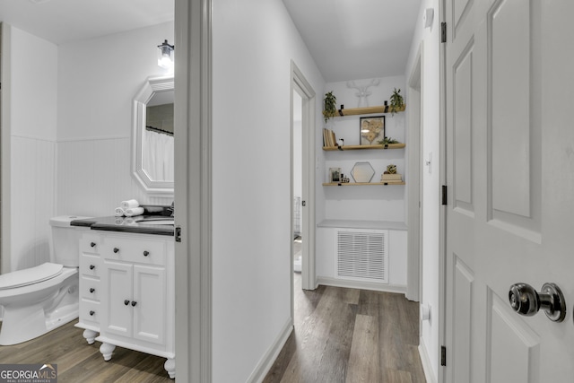 322 Pea Ridge Rd, Franklin, GA 30217 - hall featuring dark wood-style floors and wainscoting