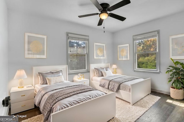 322 Pea Ridge Rd, Franklin, GA 30217 - bedroom with wood finished floors and ceiling fan